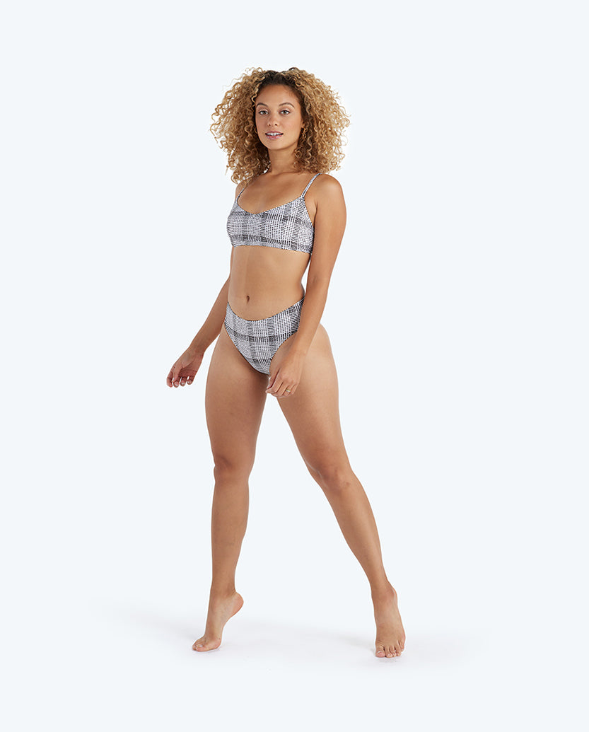 The Limited-Edition High Leg Mid Rise Bikini Bottom - Modern Plaid in White Sand